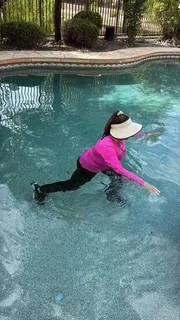 Donna Lewen demonstrating Ai Chi movement in the water